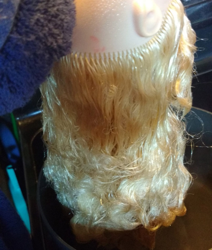 How to straighten doll hair